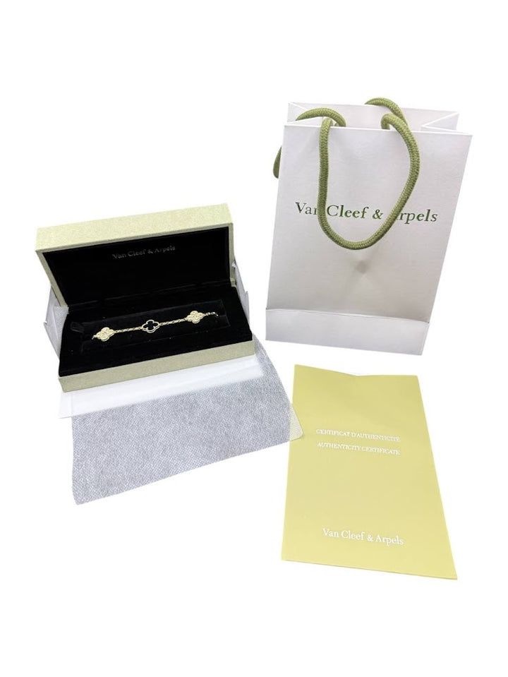VAN CLEEF NEGRA CON DORADO BRILLO
